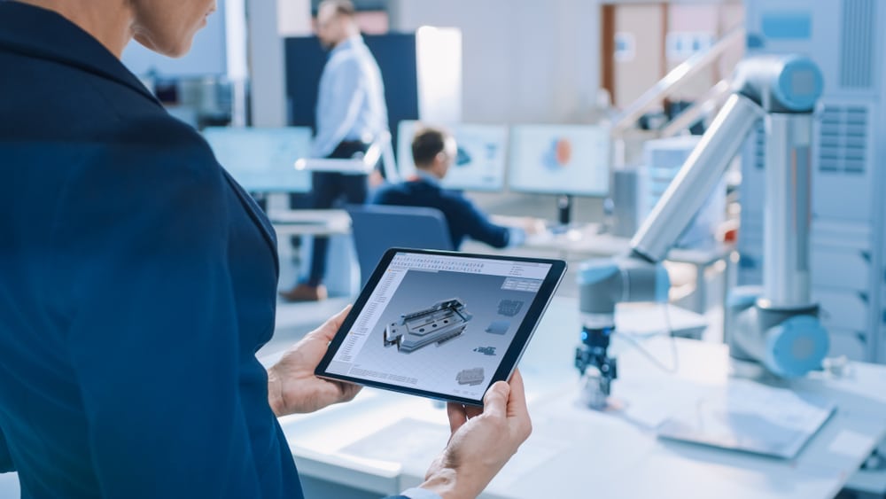 Scientist holding an Ipad.