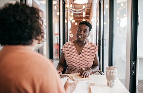 Women offering new mortgage rates to the client