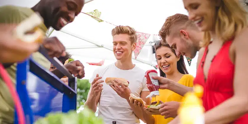 People outside at a cookout