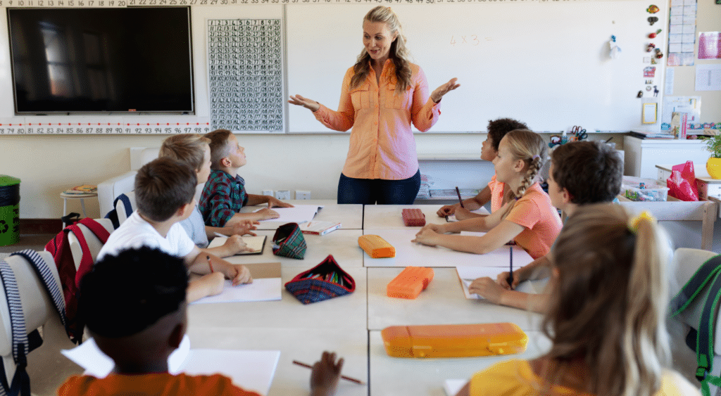 Teacher in front of classroom of students